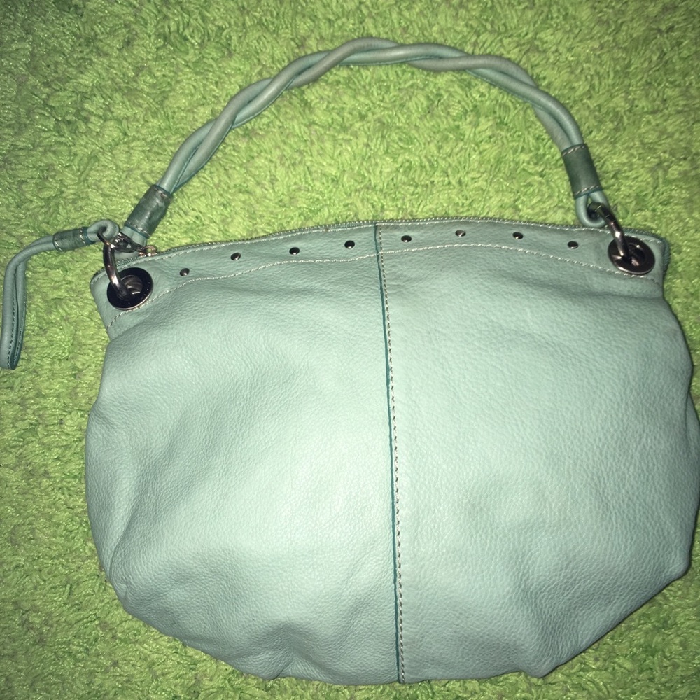 Fossil mint color handbag.